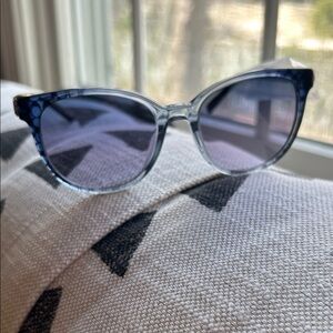 Coach sunglasses.  New w/o tags. Brand new Coach case. Grey blue.